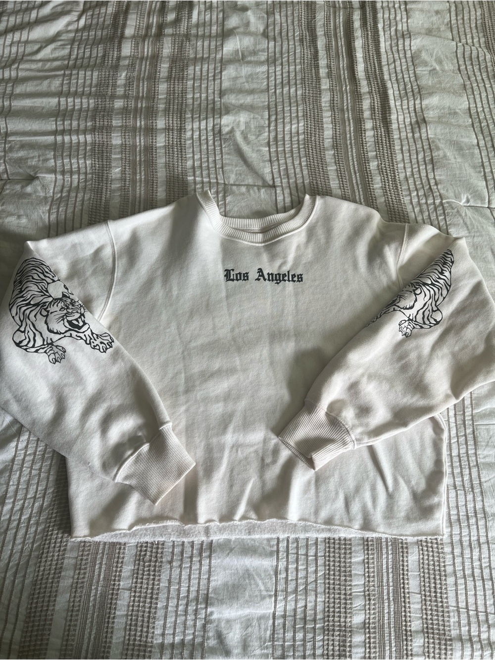 Hollister White Crewneck Sweater with Black Tiger Sleeve Prints